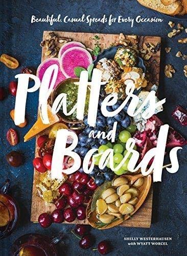Cookbook cover displaying a colorful, abundant charcuterie board arrangement.