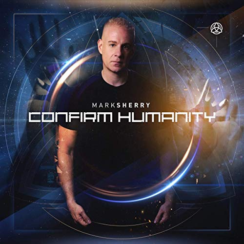 Man in black shirt surrounded by futuristic blue and orange circular design.
