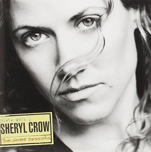 Black and white CD cover featuring a close-up of Sheryl Crow’s face.