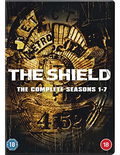 DVD cover for "The Shield" seasons 1-7, featuring a police badge.