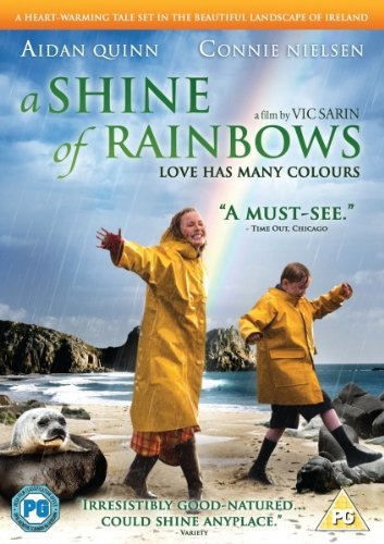DVD cover for “Shine Of Rainbows” featuring two children in yellow raincoats.