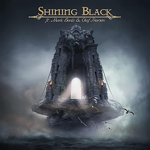 CD cover showing a stoneL stone archway on a floating rock over dark water.