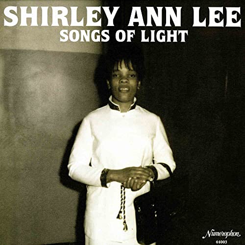 Black and white album cover featuring Shirley Ann Lee wearing a white collared jacket.