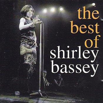 Shirley Bassey album cover, singer at a microphone on stage.