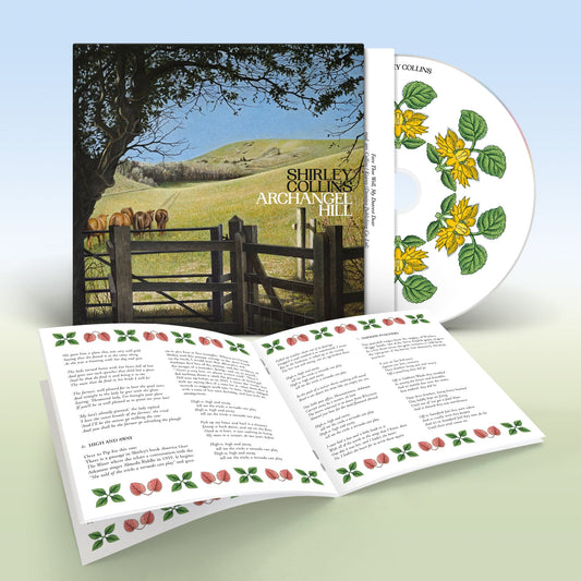 "CD case with countryside image, open booklet, and CD featuring yellow flowers."