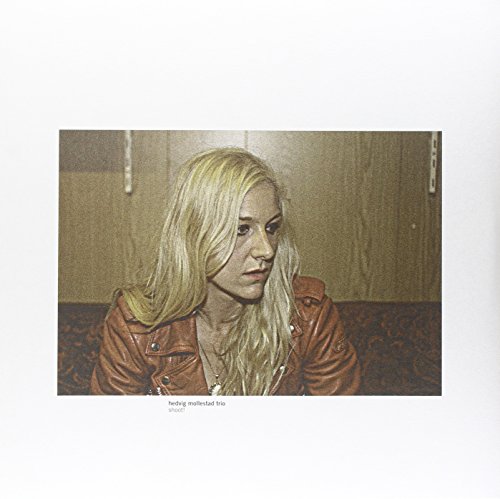 Vinyl record cover featuring a woman with long blonde hair in a leather jacket.