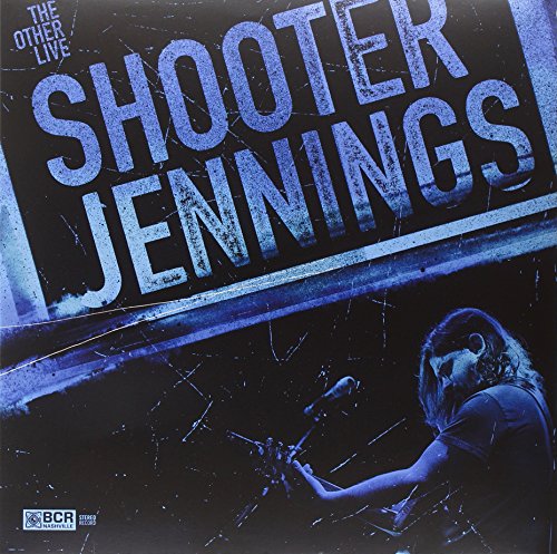 "Shooter Jennings vinyl album cover featuring a man playing drums, blue-toned image."