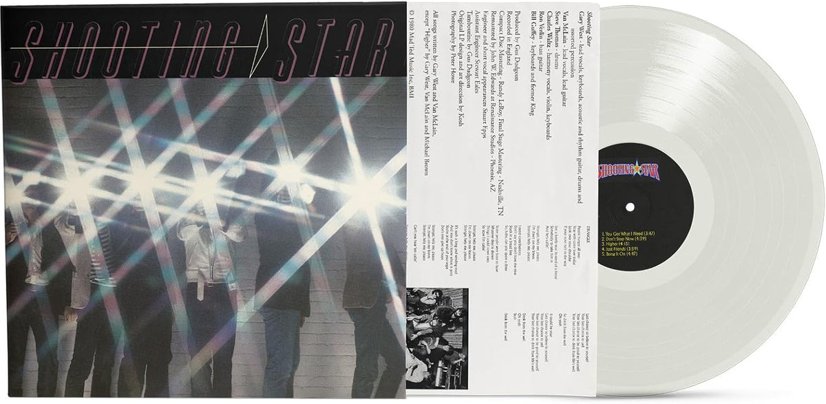 Clear vinyl record with a purple and blue shooting star album cover.