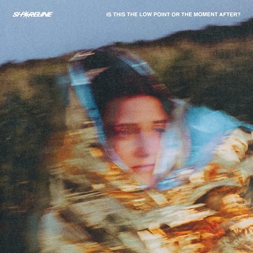 A blurry, motion-filled portrait of a person against a dark, textured landscape background.