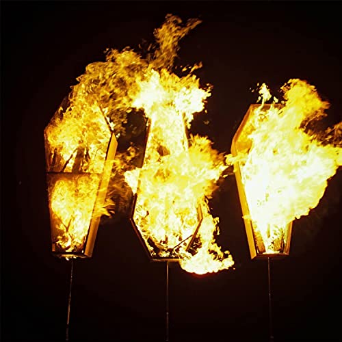 Three flaming coffin-shaped structures against a dark background.
