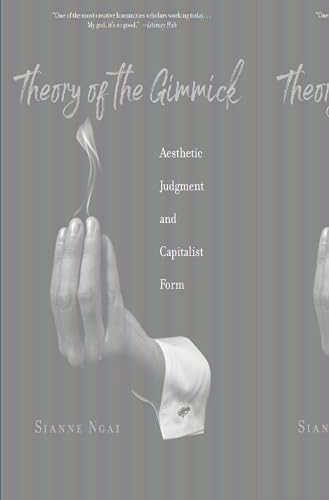 Book cover: hand holding a cigarette, title “Theory of the Gimmick”.