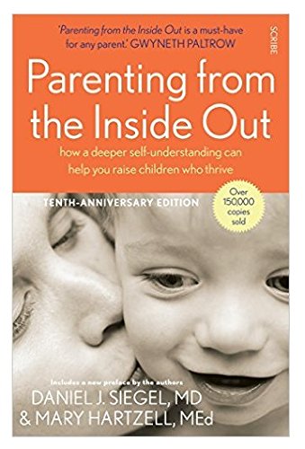 Book cover showing a parent kissing a child with orange and white text.