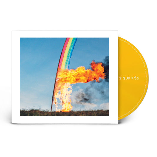 Sigur Rós ATTA CD cover showing a burning rainbow banner with a yellow disc.