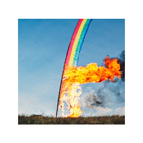 Sigur Rós album cover: burning rainbow against a blue sky.