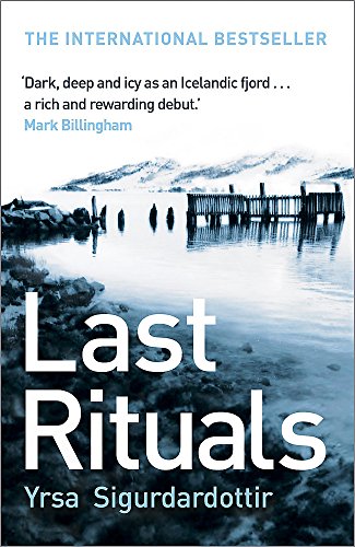 Book cover: icy landscape, wooden structures, and large white title "Last Rituals".