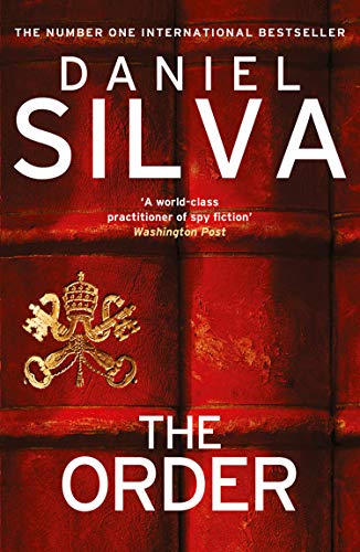 Book cover for “The Order” by Daniel Silva, featuring a golden key.