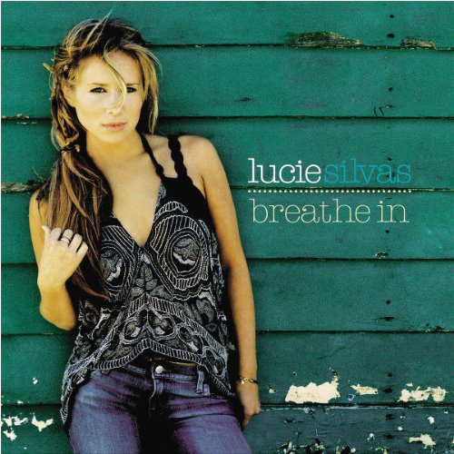 Album cover for Lucie Silvas’ “Breathe In” featuring a portrait of the artist.