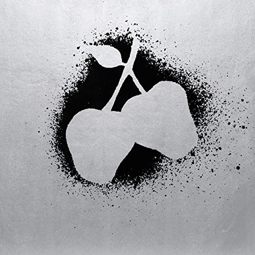 Silver apples spray-painted on a textured silver background.