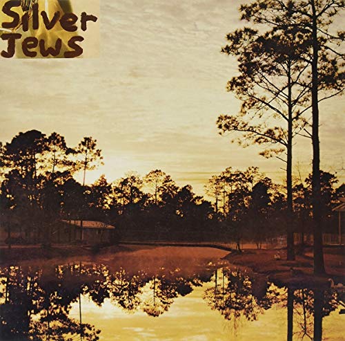 Silver Jews album cover: trees and a pond reflecting a golden sunset.