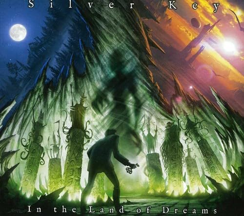 CD cover: man with key amidst surreal, dreamlike landscape.
