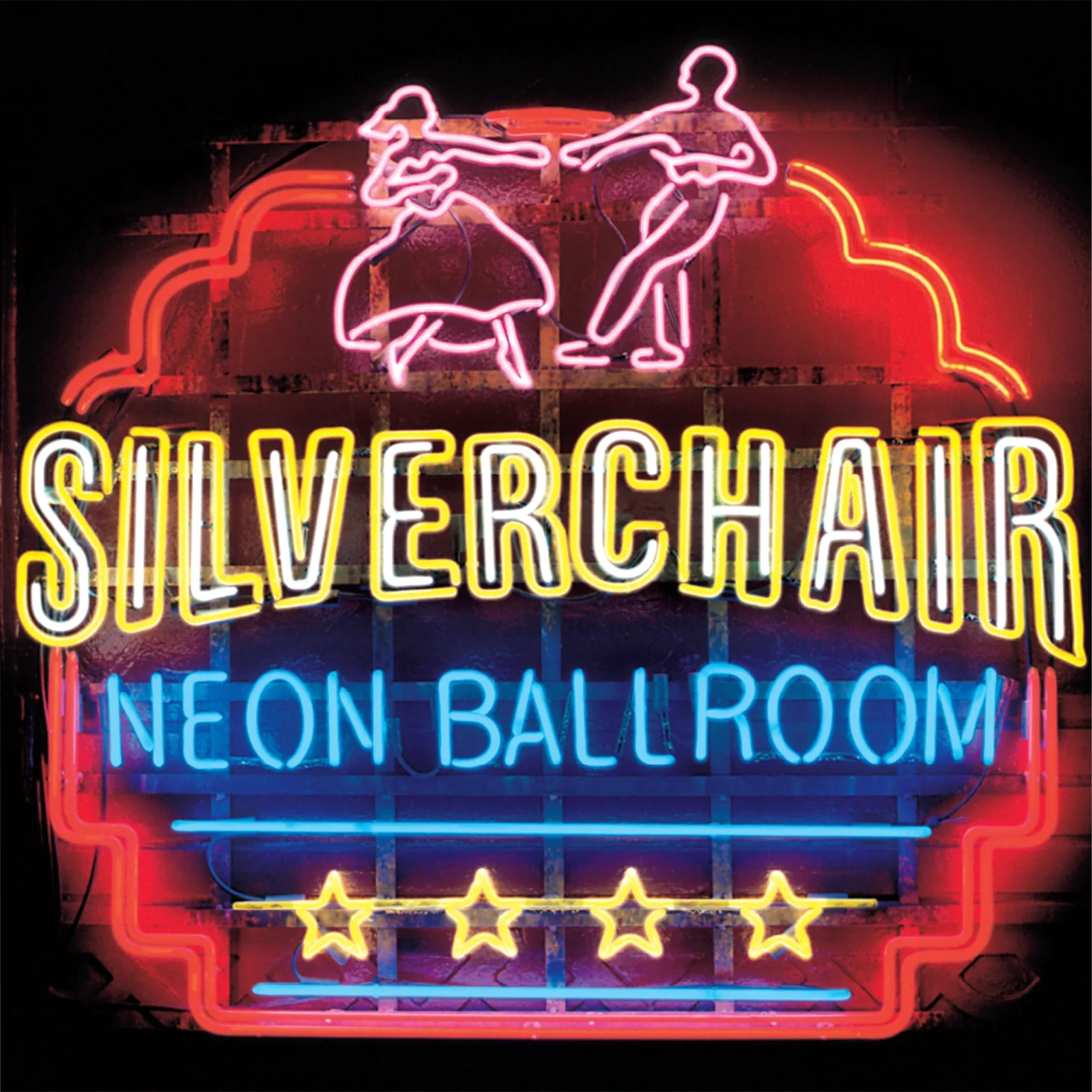 Neon sign reading Silverchair Neon Ballroom with dancing figures and four stars on grid.