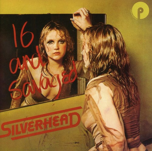 Album cover showing a person looking into a mirror with text overlaid.