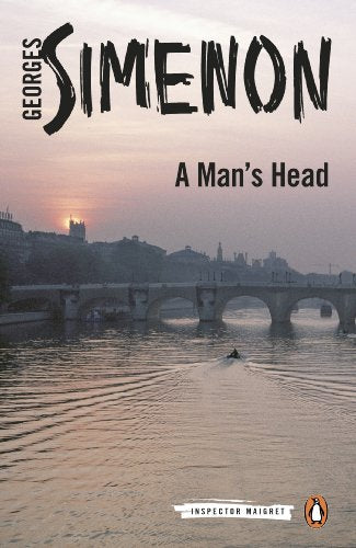 Book cover: "A Man's Head" by Georges Simenon, with a Parisian cityscape.