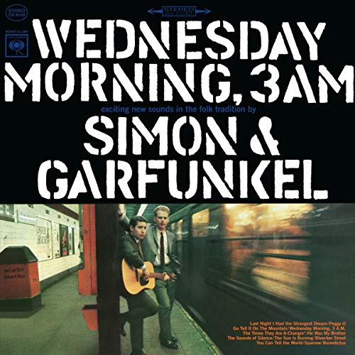 "Simon & Garfunkel album cover featuring the duo on a subway platform with guitar."