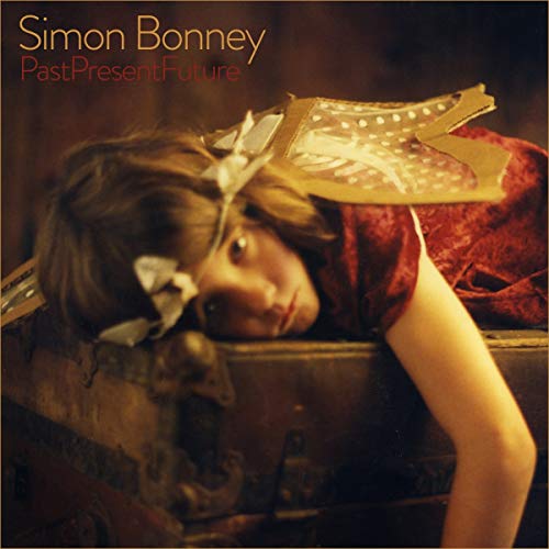 Album cover featuring a person with vintage ephemera and red fabric.
