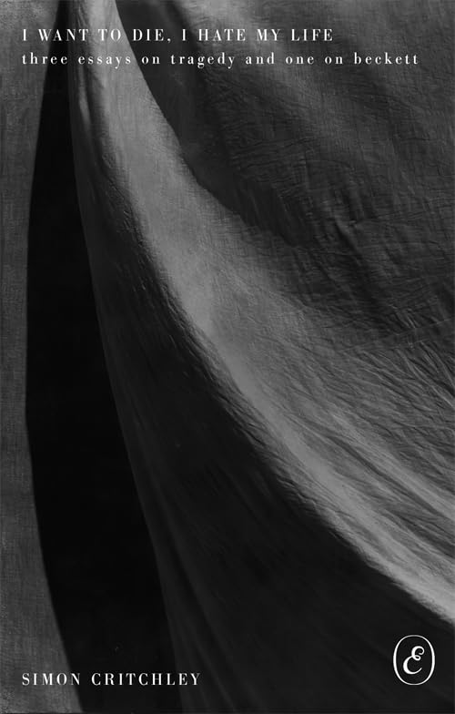 Book cover with dark, flowing fabric and white title text.
