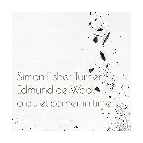 Vinyl record cover with text and abstract black splatter design.