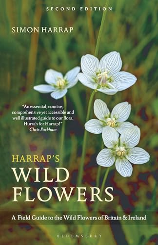 Book cover for Harrap’s Wild Flowers featuring white flowers against a green blurred background.