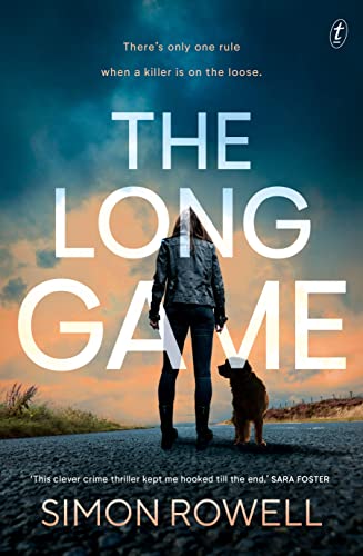 Book cover: woman and dog on a road, titled "The Long Game.