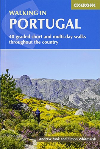 The image depicts a book cover with a hiker on a mountainous trail.