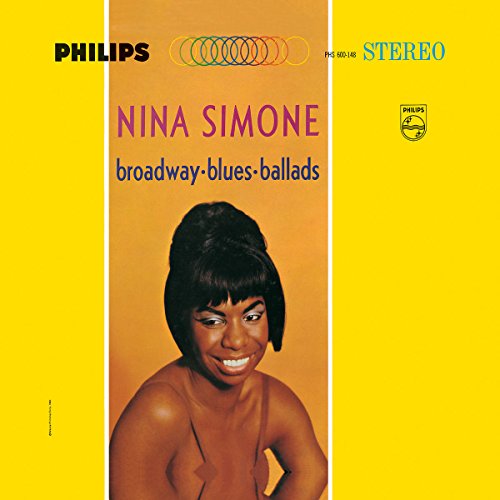 Nina Simone vinyl album cover with a portrait of Nina Simone on a yellow background.