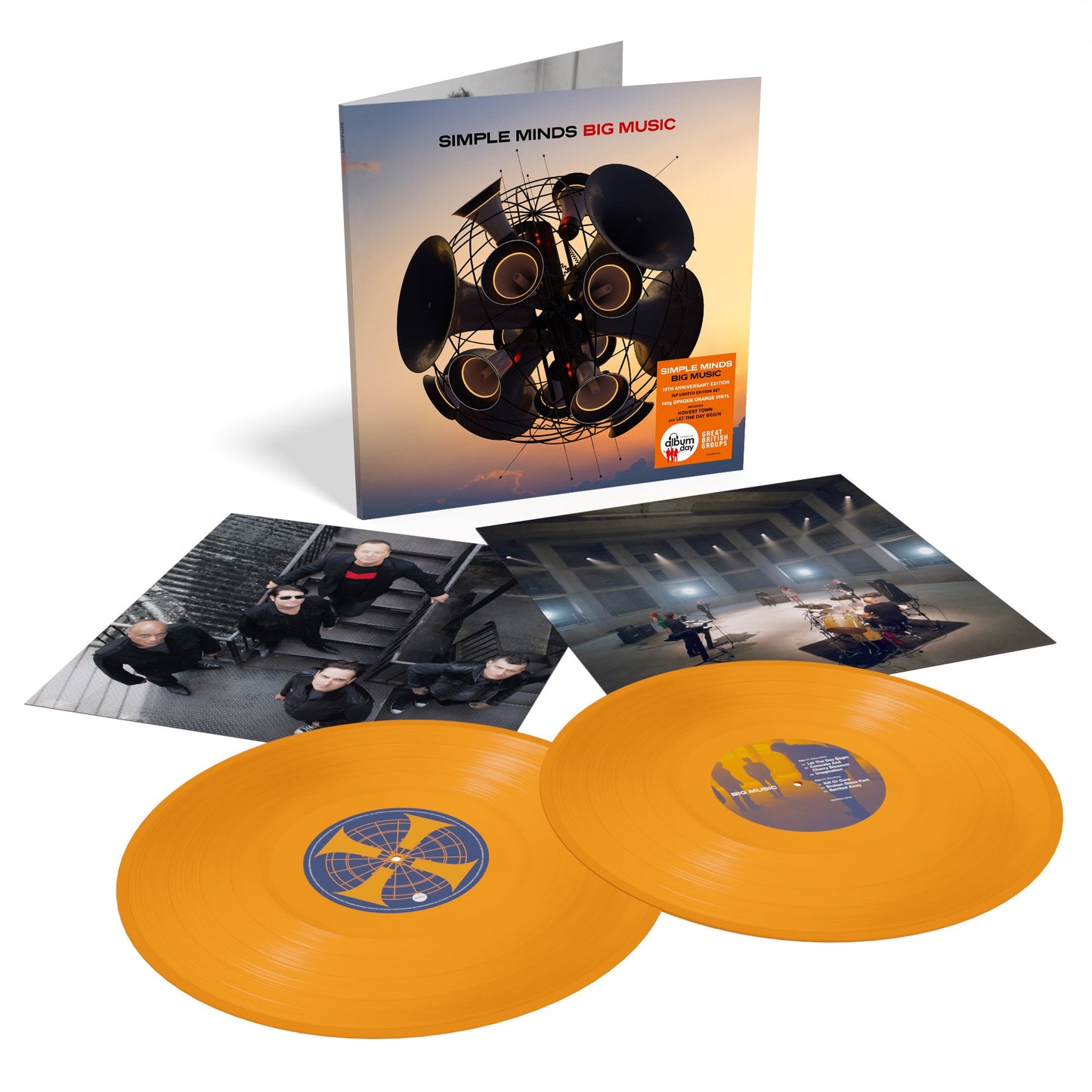 Simple Minds "Big Music" opaque orange vinyl LP with album artwork and band photo.