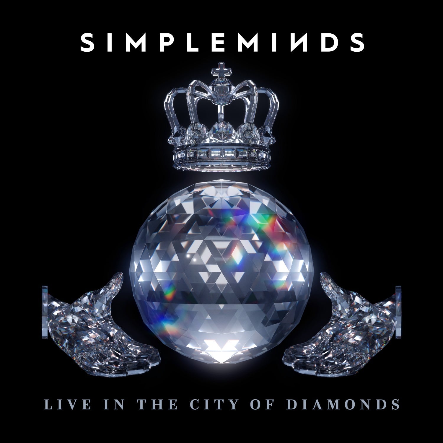 Simple Minds album cover: crystal crown, disco ball, and hands.