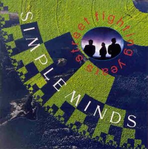 Album cover for Simple Minds featuring three silhouettes in a circle over green textures.