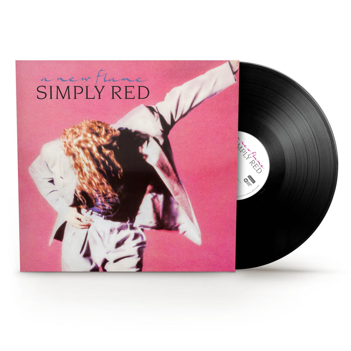 Simply Red “A New Flame” vinyl record with couple embracing on cover.