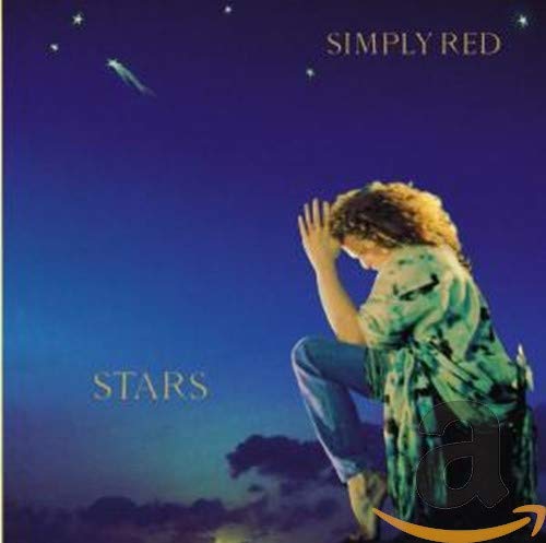 Simply Red Stars album cover featuring a person kneeling against a starry night sky.