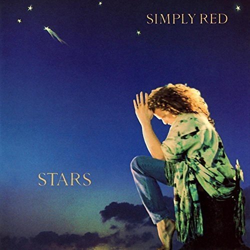 "Vinyl record cover featuring a man crouching under a starry night sky."