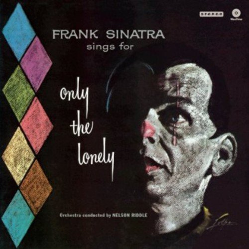 Frank Sinatra vinyl album cover with a crying man and diamond pattern.