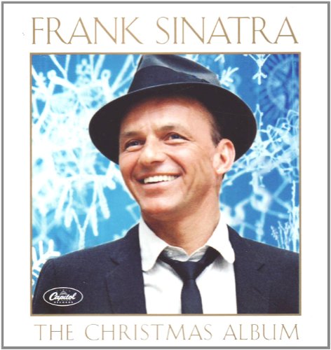 Frank Sinatra in a hat smiles on the cover of “The Christmas Album.”