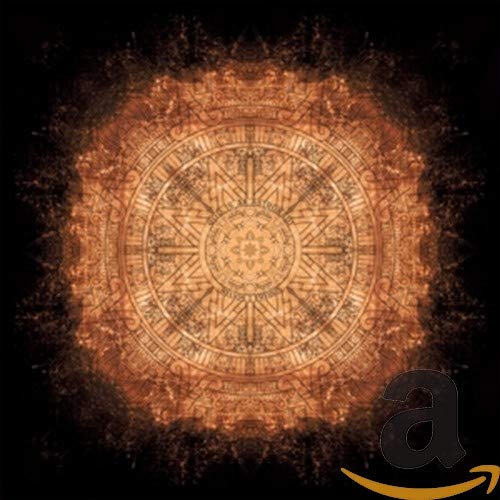 Circular orange mandala-like pattern with intricate geometric designs on a black background.