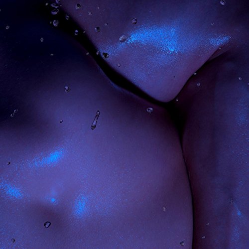 Abstract blue image with water droplets, resembling skin or liquid.