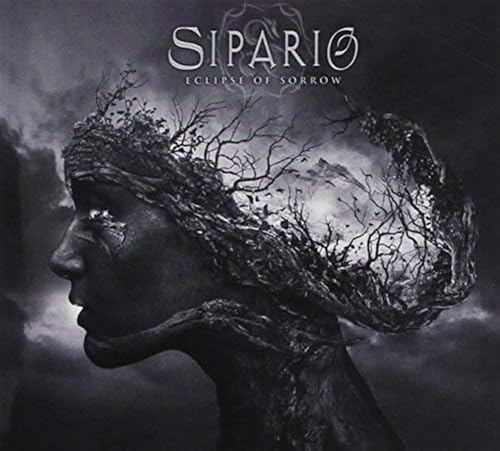 CD cover: woman’s face merging with branches against a cloudy sky.