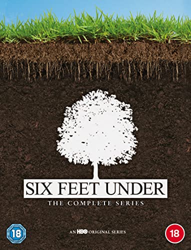 Six Feet Under" DVD cover with a white tree on dark soil.