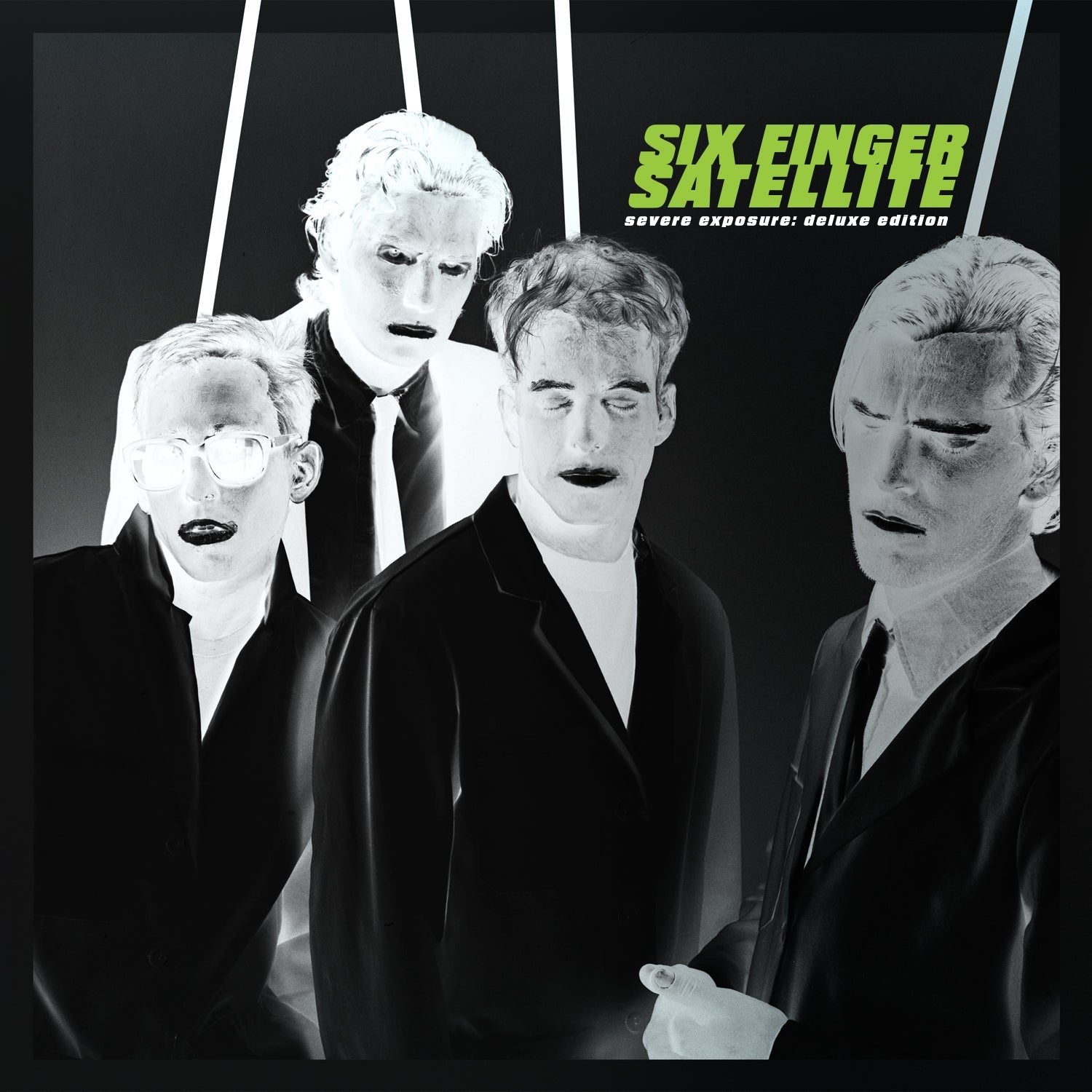 Black and white album cover featuring four people in dark suits.