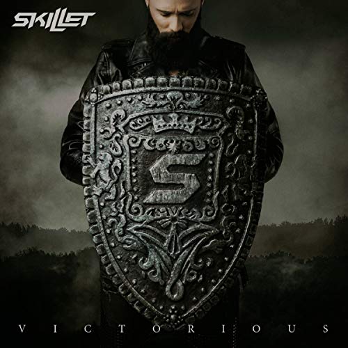 Skillet's "Victorious" CD cover: bearded man holding an ornate shield.