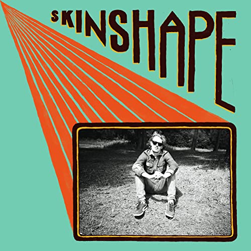 Record cover with artist Skinshape and a portrait of a man outdoors.